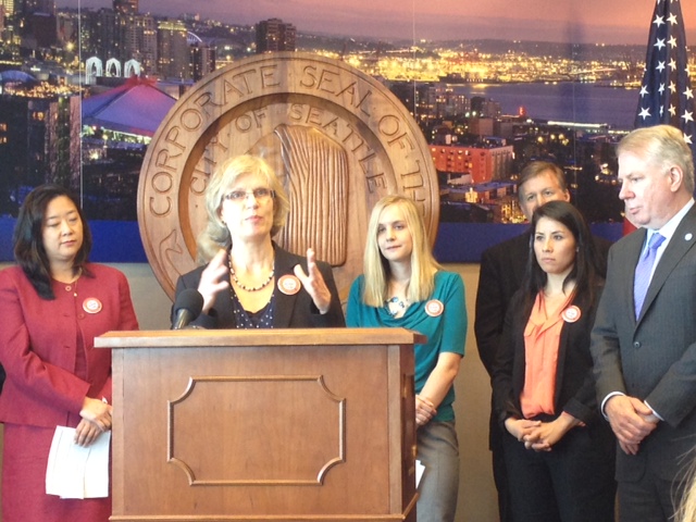 EOI’s Marilyn Watkins, member of the City of Seattle’s Gender Equity In Pay Task Force, speaks at a City Hall press conference on the panel’s recommendations.