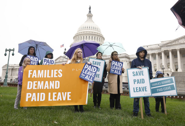 WASHINGTON, DC - NOVEMBER 02: Families, parents, and caregivers bring their stories and voices to Capitol Hill to call on Congress to include paid family and medical leave in the ‘Build Back Better' legislative package during an all day vigil spotlighting the human cost of not having a national paid leave policy on November 02, 2021 in Washington, DC. (Photo by Paul Morigi/Getty Images for PL+US)