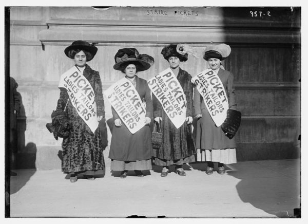 Photograph shows four women strikers from Ladies Tailors union on picket line during the "Uprising of the 20,000," garment workers strike, New York City.