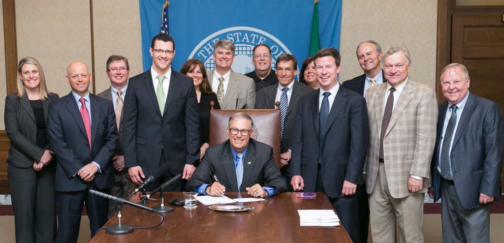 Jay Inslee signs