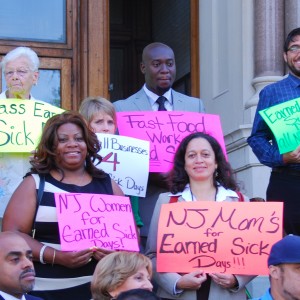 Supporters of Jersey City paid sick days legislation gather for a rally in September 2013.